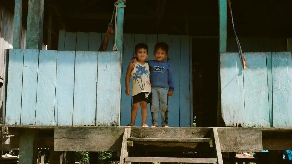 Family with children outside their home